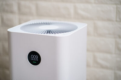 Closeup of Air purifier with monitor screen, show air quality in the room