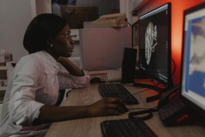 Doctor using Computer to Check Dog's Xray